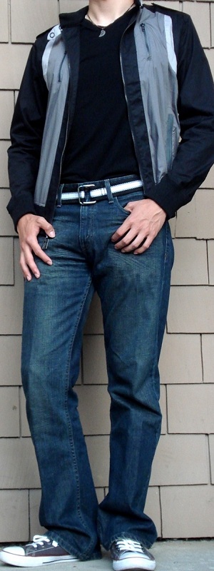 Casual Black and Grey Windbreaker Jacket with Dark Blue Bootcut Jeans and Low Top Sneakers Outfit