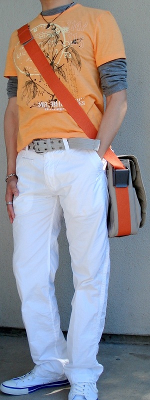 Casual Layered Orange Graphic Tee with White Pants and Canvas Messenger Bag