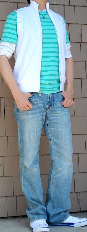 Casual Layered Outfit with White Vest Green Striped T Shirt and Light Wash Jeans