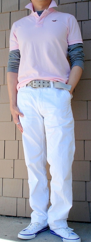 Casual Layered Pink Short Sleeve Polo Shirt over Grey Long Sleeve T-Shirt with White Chino Pants Outfit