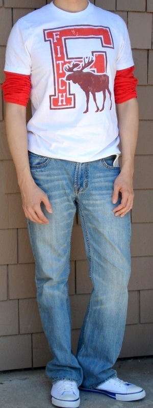 Casual Layered White Graphic Tee over Orange Long Sleeve Tee with Light Wash Jeans Outfit