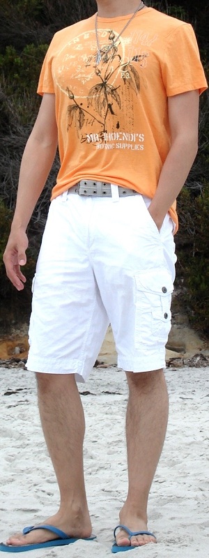 Casual Summer Orange Graphic Tee with White Cargo Shorts and Sandals