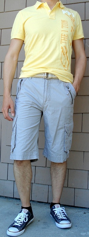 Casual Summer Outfit with Yellow Polo Shirt Grey Chino Shorts and Gold Belt