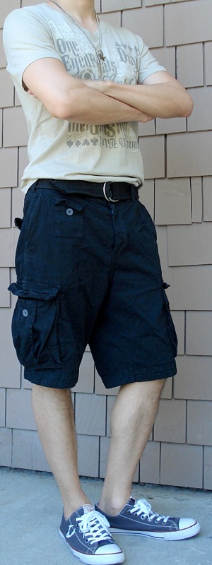 Casual Summer Street Style with Beige Graphic Tee and Black Cargo Shorts
