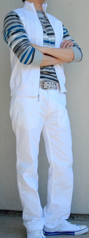 Monochromatic White Outfit with Multi-Color Striped T-Shirt and Mock Neck Vest